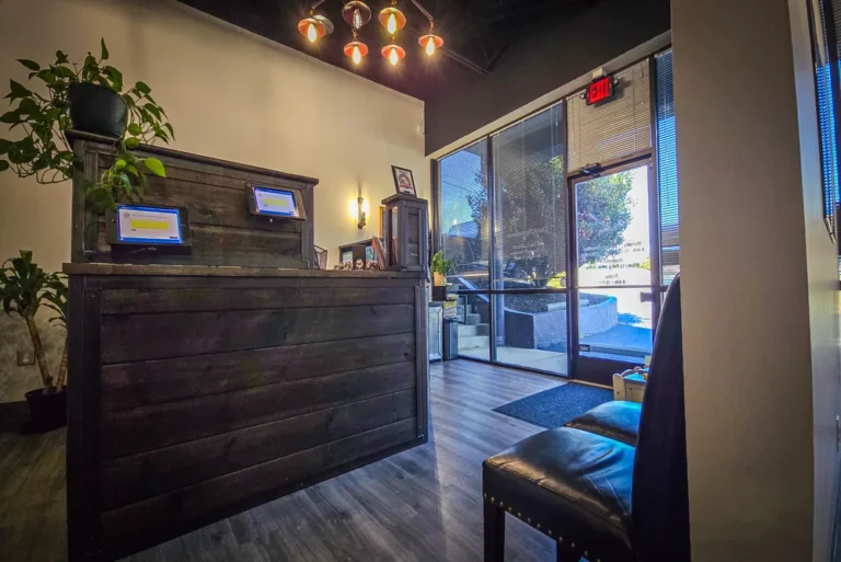 Home 42 Reception desk and lobby area at Chiro Life Wellness.